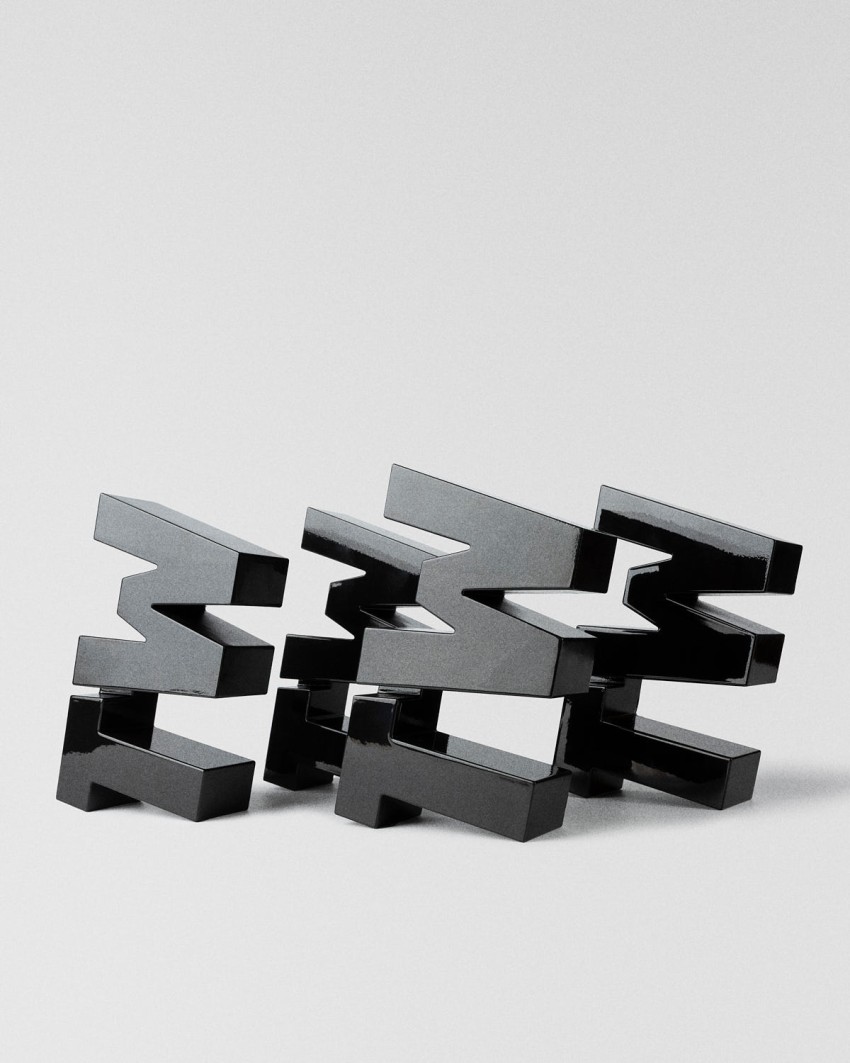 TextilWirtschaft Forum Award 2026 Trophäe schwarze TW Typografie