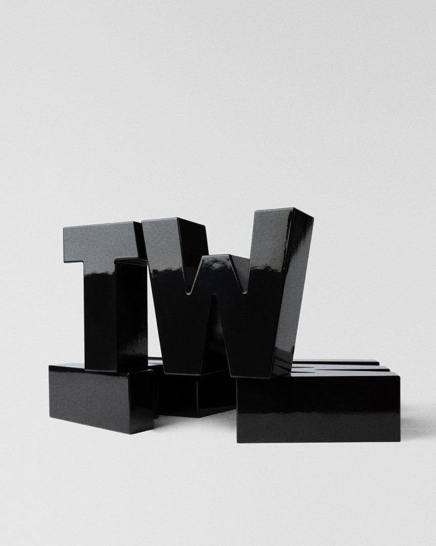 TextilWirtschaft Forum Award 2026 Trophäe schwarze TW Typografie